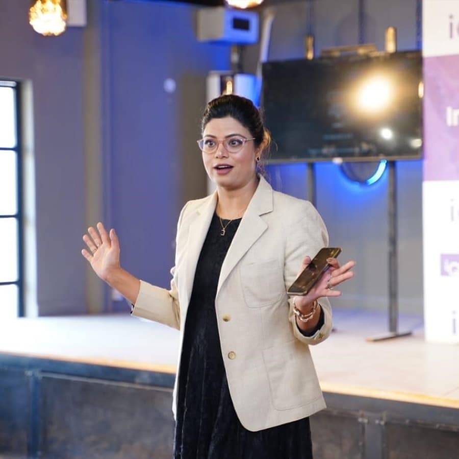 Noushin Paracha speaking at an event